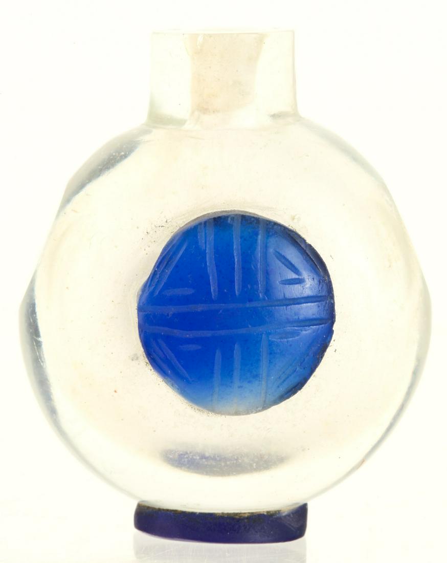 CHINESE PEKING GLASS SNUFF BOTTLE: Cobalt cut to cloudy. 2 1/8 inches. Provenance: Purchased at auction in the 1940s by the consignor's grandfather Condition: Minute rim chips Temp No 6152