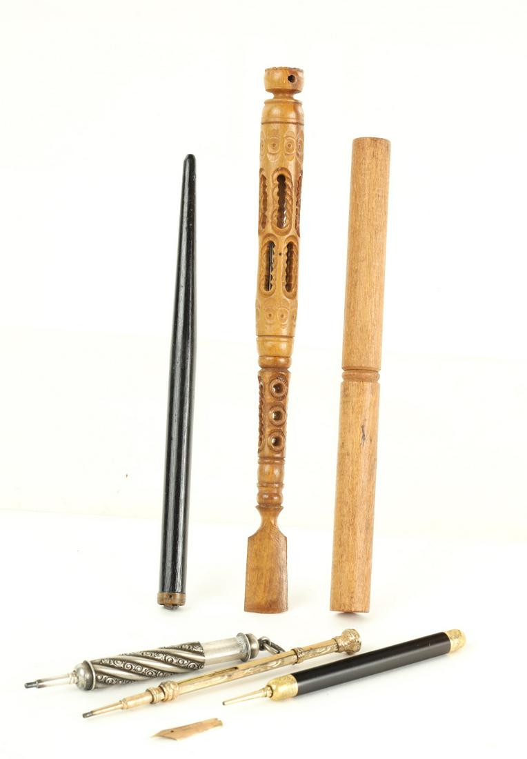 CALLIGRAPHY LOT: (3) chatelaine pencils, carved wooden dip pen with Stanhope, glass dip pen, bone dip pen, etc. Carved wooden dip pen measures 7 3/8 inches. Condition: Good, loss & crack to carved wooden dip pen.
