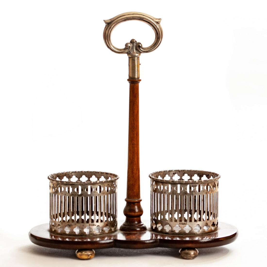 WINE DECANTER HOLDER W/ STERLING HARDWARE: Mahogany with fan inlay. Hallmarked "G(turtle)J" (Goodnow and Jenks) 9 3/4" x 8 1/2" Condition: Good Temp No 3687-905