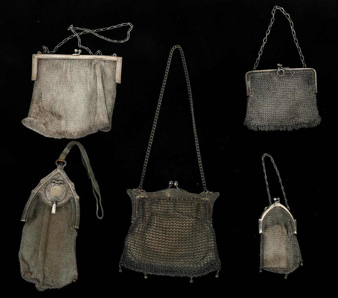(5) 1920s- 1930s CHAIN MAIL PURSES: Including: Largest example with squared clasp marked sterling, (1) Marked Piccadilly and (3) unmarked, 5 x 5 inches (and under excluding handle). (1) Marked sterling weighs 3.68 troy ounces Condition:
