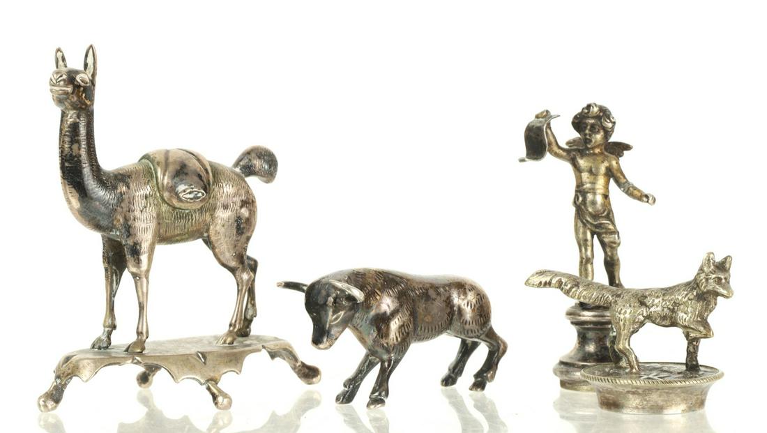 (4) SILVER CURIOSTITIES: Including: Fox stopper, Cherub stamp, bull and lama. 2 3/4 x 2 3/8 x 1 3/8 inches. Unmarked untested Condition: Good Temp No 4346