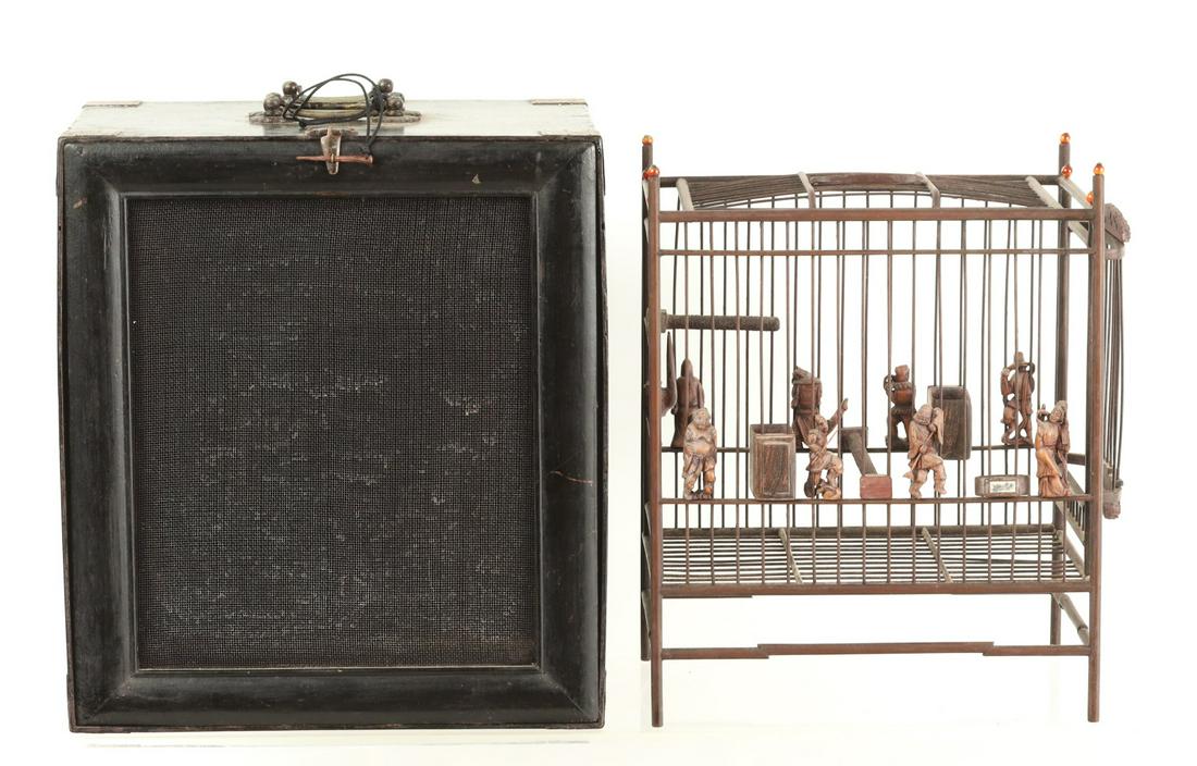 CHINESE BIRD CAGE w/ FIGURAL CARVINGS & TRAVEL BOX: Black lacquered travel box with copper mounts. Late (19th C) or early (20th C) bird cage with carvings of men & women and mythological figures secured to the bars of the cage. The door to the cage is 