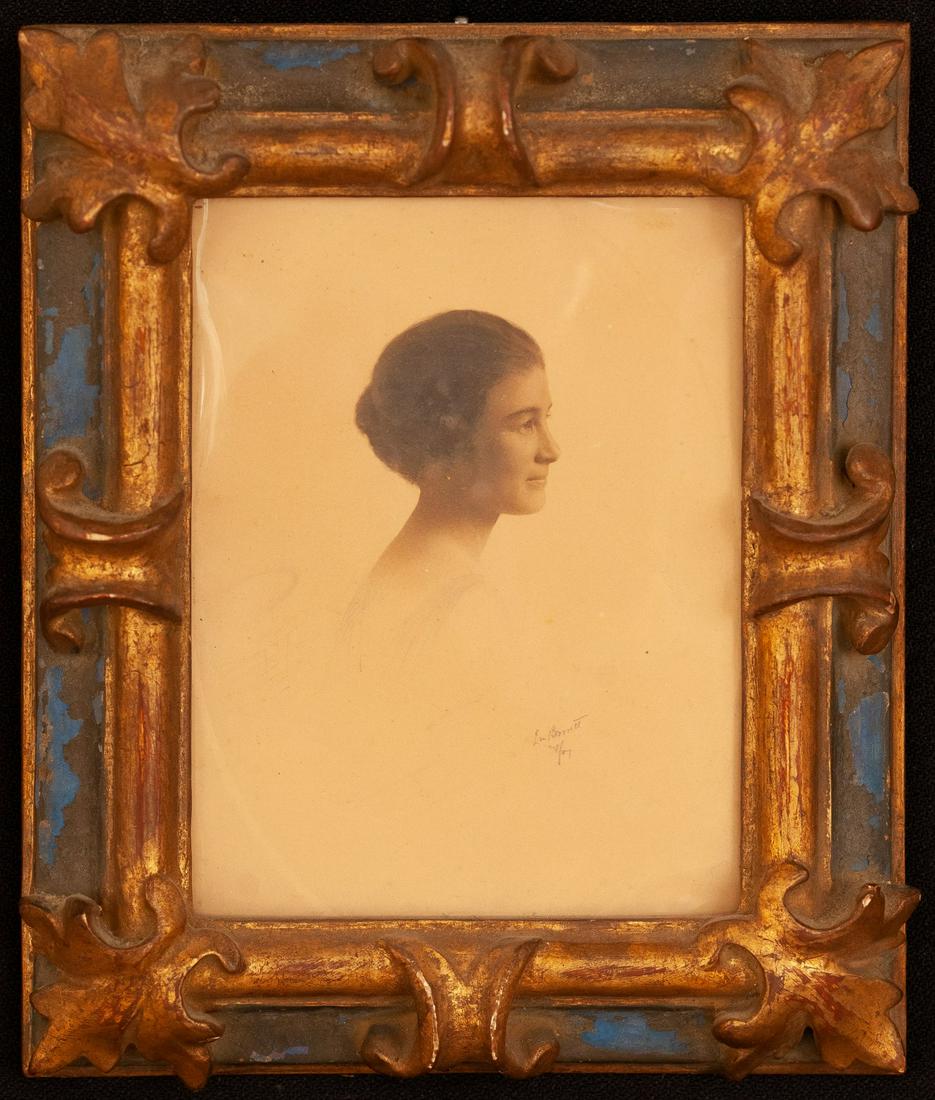 GILT AND PAINTED FLORENTINE FRAME: Together with a photograph of a woman. 8 1/4 x 7 inches (overall)