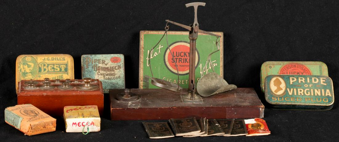 TOBACCONALIA LOT: Balance scale and calibration weights also included. Tobacco brands include Mecca, Prince Albert, R.J. Reynolds, Lucky Strike, Piper Heidsieck, Pride of Virginia, and J.G. Dillâ€™s. Scale measure