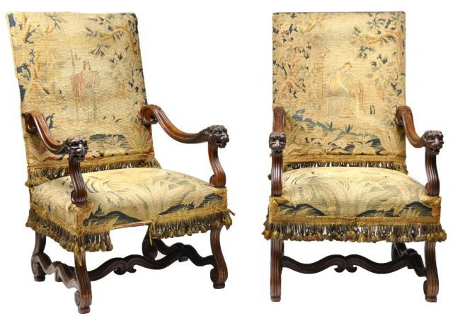 English Victorian high-back three-piece library: English Victorian high-back three-piece library suite, with needlepoint and petit point estate garden scenes, loveseat and pair of open arm chairs with carved acanthus leaf issuing Lions heads, rising