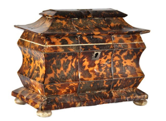 19th century English tortoise shell tea caddy: Early 19th century English tortoise shell tea caddy in pagoda form, on ivory button feet, top opens to reveal to canister sections, 6.5" x 7.5"