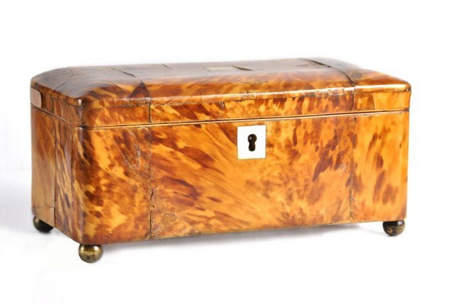 19th century English tortoise shell tea caddy: early 19th century English tortoise shell tea caddy, with ivory inset escutcheons, 9.5" x 4.5"