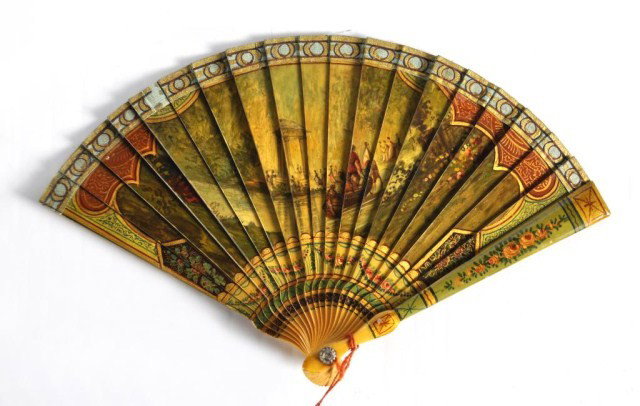 Framed hand painted early 20th c. ivory miniature: Framed hand painted early 20th c. ivory miniature fan, two-sided with Italian River scene, retaining the original label identifying it, as decorated in Versailles. Retailed by Marcus & Co, 4 1/2"h