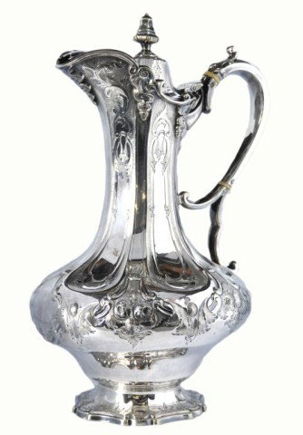 European silver plated covered ewer: European silver plated covered ewer with acorn finial, stylized floral engraving and repousse, hallmarks include scepter, R & H. Height: 11 1/2"