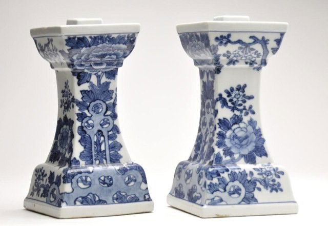 Pair of blue and white Chinese porcelain candle ho: Pair of blue and white Chinese porcelain candle holders with an apocryphal Qianlong inscription. H: 9"