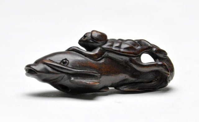 Carved wood netsuke, Meiji period, of a turtle: Carved wood netsuke, Meiji period, of a turtle astride a fish, signed. L: 2 3/8"