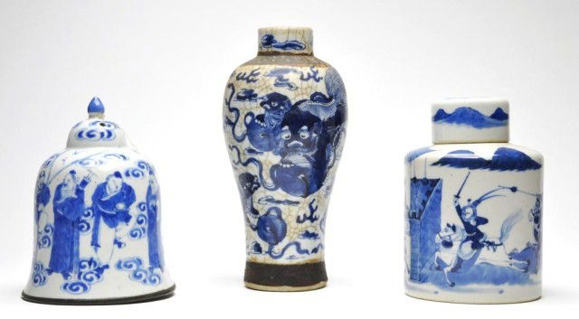 Lot of three Chinese blue and white porcelains: Lot of three Chinese blue and white porcelains, ovoid vase in crackle glaze, fu-dog motif having apocryphal mark, 9"h, covered tea jar with horseback warriors, 6 3/4"h and a bell with figures, 6 1/2"h