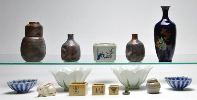 Lot of Asian porcelains: Lot of Asian porcelains, Bizen vessel with cover in signed box, pair of floriform bowls, 6" d., set of three graduated boxes, celadon covered box, blue and white decorated vessel