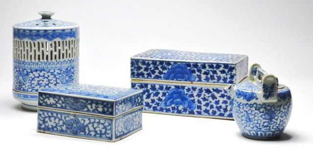 Four Chinese blue-and-white porcelains: Four Chinese blue-and-white porcelains, late Qing/Republic period, each with penciled foliate design, consisting of a two-piece lantern, a divided box, a small box and a small pouring vessel. Lantern