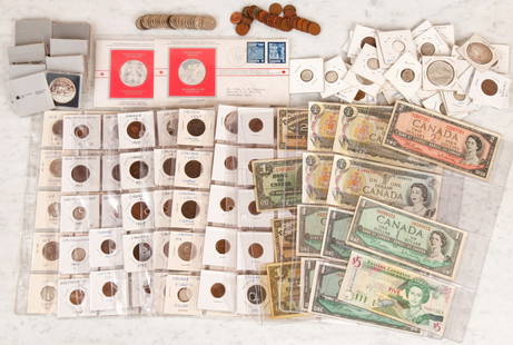 GROUPIN OF CANADIAN COINS & MINT SETS etc.: Including: (7) Canadian silver dollars from the Canadian Mint. (2) Commemorative Sterling silver Proof Issues. Together with a collection of Canadian coins and currency.
