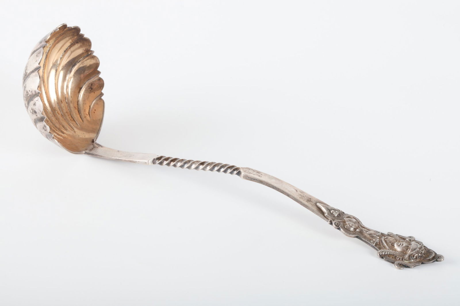 FIGURAL DUHME & CO STERLING SILVER PUNCH LADLE: 12 inches. 5.825 troy ounces.