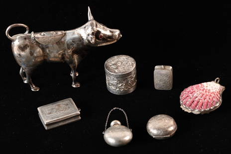 GROUPING OF SILVER OBJECTS of VIRTURE: Including: Silver cow creamer with garnet eyes, Far East Indian pill box with chased jungle animals, Italian pill box incorporating a cockle shell, round hinged pill box, F & B sterling perfume penden