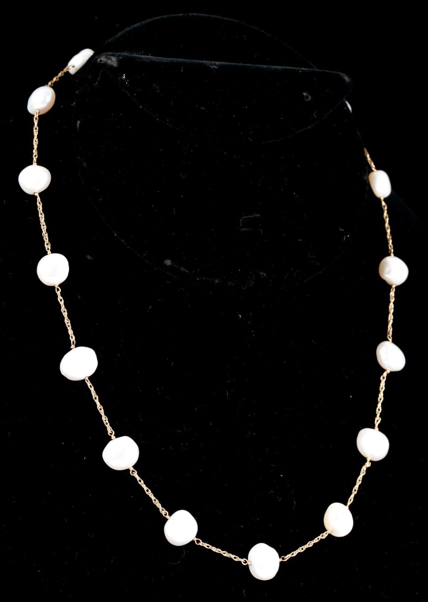14K BAROQUE PEARL STATION NECKLACE: 17 inch length. Total weight 8.46 dwt.