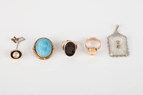 GROUPING OF ANTIQUE and VICTORIAN JEWELRY: Including: Oscar E. Place & Son Gold Cameo Ring size 6 1/4., Victorian rose gold ring set with a citrine size 7, Blue cameo brooch, crystal pendant and a 10k gold pin set with a moonstone with onyx be