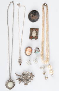GROUPING OF STERLING SILVER JEWELRY etc.: Including: Danecraft floral 3 inch brooch, Navajo silver and turquoise ring, artisan crafted sterling silver necklace and pendant set with a garnet and a sterling pin engraved with a Thai ship made in