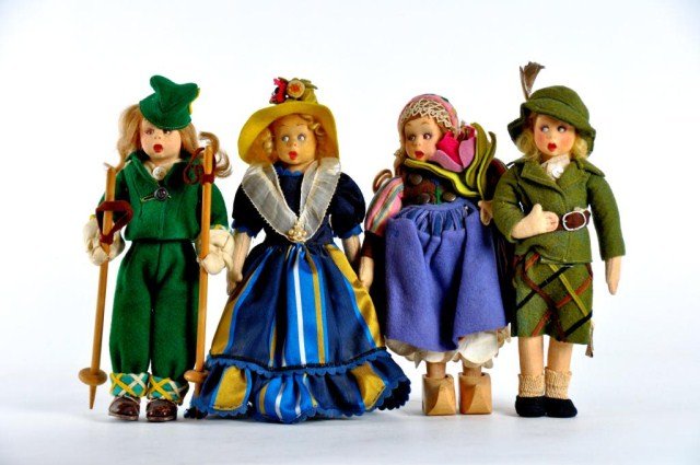 Lot of four Lenci Mascottes: (1) female 9" skier with script tag, rooted Mohair wig, very detailed clothing, felt pants and jacket, felt blouse with same patterns as cuff, wooden ski poles and leather shoes 1) 9" German lady with