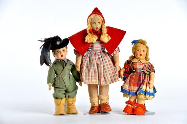 Lot of three cloth dolls: (1) 7" tagged Lenci girl with plaid print dress with felt collar, shoes and ball under arm (1) Lenci Mascotte, tagged, with felt loop for hanging, detailed all felt outfit (excellent condition) (1) 10