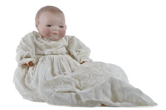 14" bisque head "Bye Lo Baby",: incised, "© 1923 by Grace S. Putnam Made in Germany" with blue paperweight sleep eyes, painted lashes, mouth and nose, on a cloth body with celluloid hands