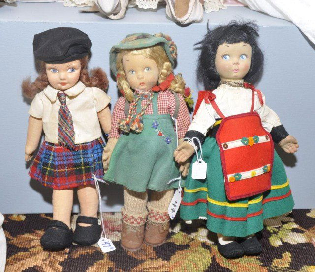 Lot of three cloth dolls,: (1) 11" girl with paper tag reads "Norah Wellings Productions Heather" with Catholic school outfit (1) 11" girl tagged with circular script Lenci, felt romper & shoes, hat and cotton blouse (soiling t