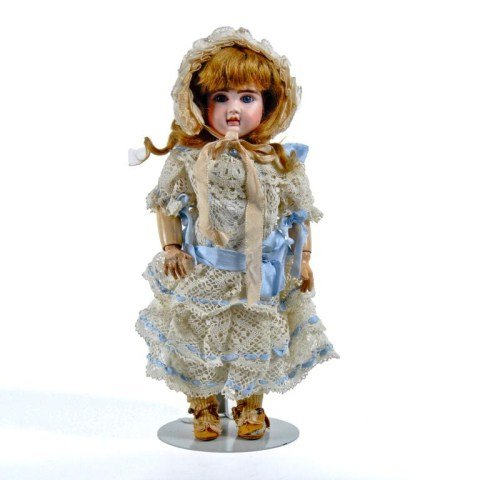 12" Bisque socket head doll by Jules Steiner,: marked in red "Le Parisien ? A5", left torso and "Le Petit Parisien Bebe Steiner" and head incised "A5", with blue fixed paperweight eyes, accent dots in eye corners and nostrils, closed mouth and fea