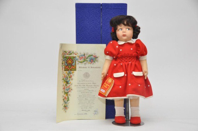 19 " Limited Edition Lenci Doll, c. 1982: (Edition limited to 999), with red and white wool felt dress. Comes with certificate of authenticity, wrist tag and paper work. Remains in Presentation Box.