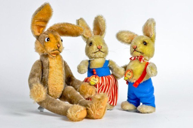 Lot of three Steiff Rabbits: (1) 14" Mohair with script Steiff button in left ear and Two 8" Mohair Rabbits with paper tag attatched named "Yella" and "Yello"