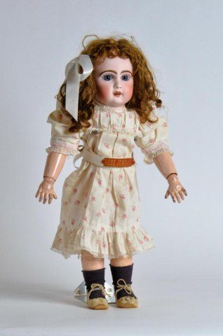 19" Bebe Jumeau Bisque socket head,: incised "8" with blue fixed eyes, pierced ears, feathered brows and lashes, and accent dots in eye corners, on a fully jointed composistion body