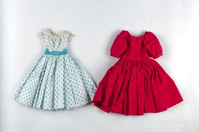 Madame Alexander Cissy dresses: consisting of acotton blue dress, polka dot lace trim, tagged and a Cissy red satin dress (very crisp)