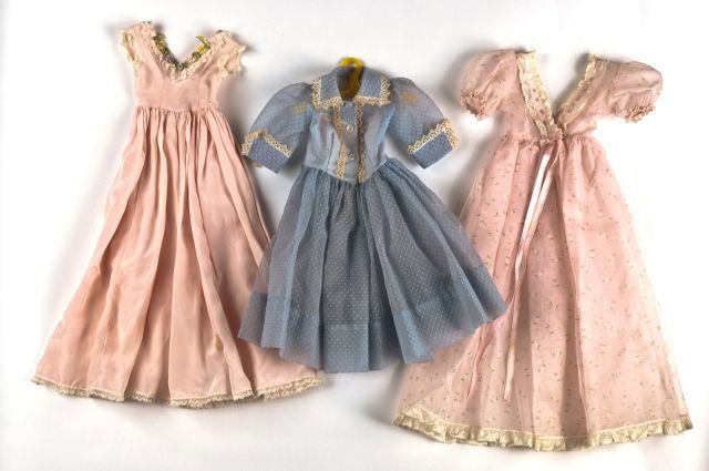 (3) Madame Alexander Cissy doll clothes: light blue dotted Swiss,pink silk night gown and rose dress all three items tagged Cissy