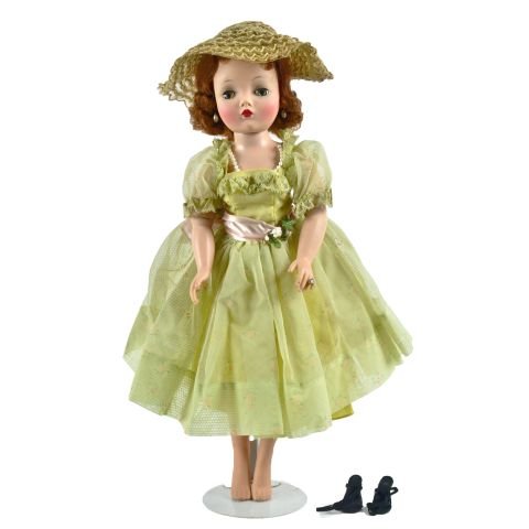 Cissy 20" - Five piece hard plastic body: w/bendable vinyl arms, red wig , tagged green floral print dress , picnic satin sash with flowers , green slip with panties, straw type hat with matching flowers, pearl earrings, solitaire ring , blac