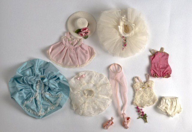 Lot of (3) Madame Alexander "Cissette" outfits: (boxed) #'d 0823,0862,& 0861A. #0823 white ballerina outfit w/floral trim, pink tights, pink ballet slippers, floers & red hanger. #0862 Pink nightgown, white lace chemise, white lace slip w/pink bow,