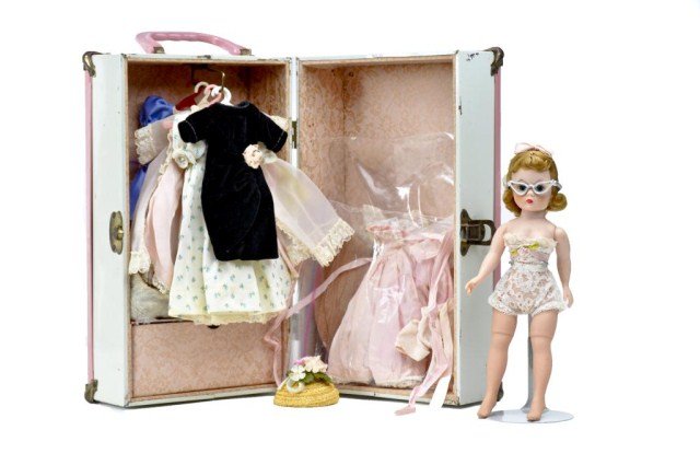 Trunk with ca. 1958 "Cissette" and clothing,: mostly tagged , wears lace chemise(tagged) comes with (7 )additional tagged Madame Alexander "Cissette" outfits - overall condition very good, trunk drawer has additional accessories, including 4 pair