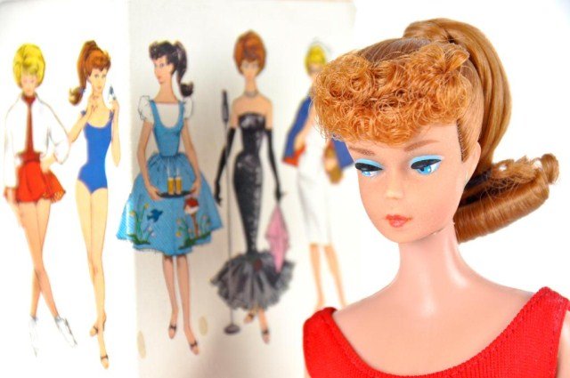 1962 Barbie Ponytail in original box- #850: redhead Barbie - original set in hair, red suit , white shoes & booklet still sealed wrist tag present but not attatched - no earrings