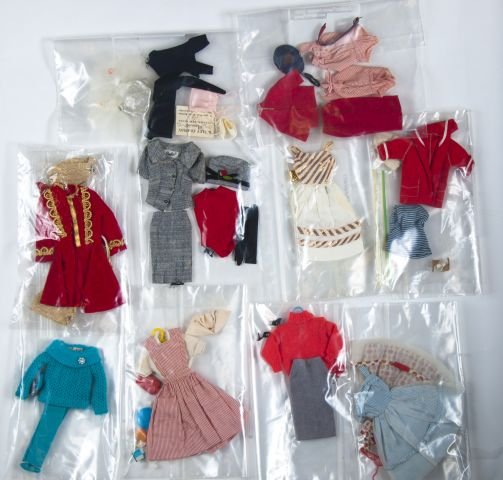 Lot of Barbie Fashions - Resort Set: (complete ), Picnic set ( 2 pr. Jeans , 2 shirts ), Orange Blossom ( complete ), Busy Gal ( no portfolio or shoes ), Career Girl ( complete ), Arabian Nights ( complete - necklace needs restringing )C