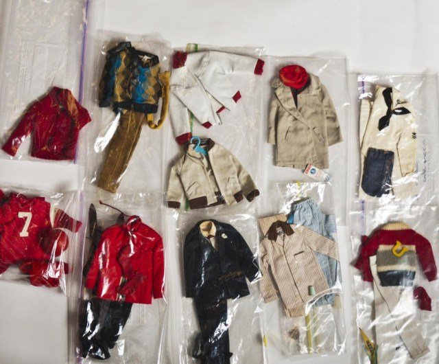 Lot of Ken fashions - Campus Hero, Tuxedo, 2: pr. PJ's - brownstripe & bluestripe, 2 clocks, glass of milk, Dr. Ken, Masquerade, Ski Champion, Sailor(missing shoes) Touchdown, Special Date, Rally Day(missing keys) 2 Jackets -leather/sweater, Fun