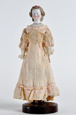 12" Parian shoulder head Dresden Doll with molded: flowers in hair, painted blue eyes and open mouth