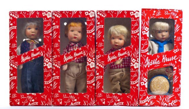 Four Kathe Kruse baby dolls, - 10" Lars - 9" boy: model Hanne Kruse,- 10" Wilhem with hat and toy boa - , 10" boy spotting on face