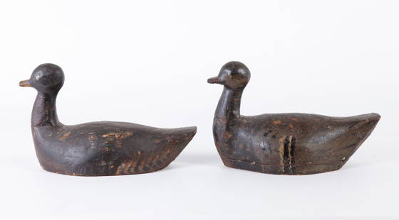 PAIR OF CARVED & PAINTED DUCK DECOYS: Folky carving of working Black Duck decoys in old finish, 10 inches long.