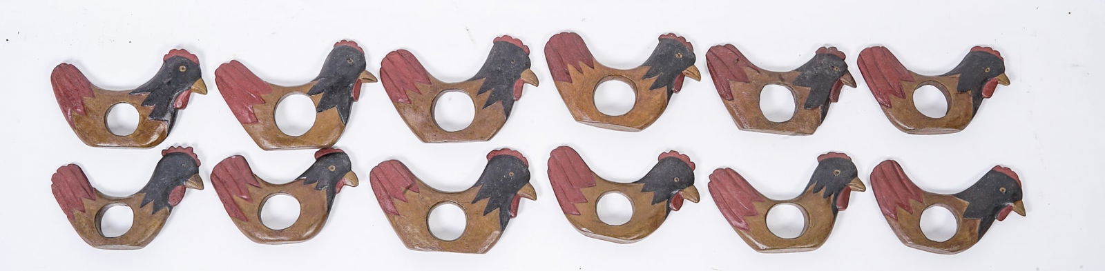 (12) HAND-CARVED & PAINTED HEN NAPKIN RINGS: approximately 5 inches wide.