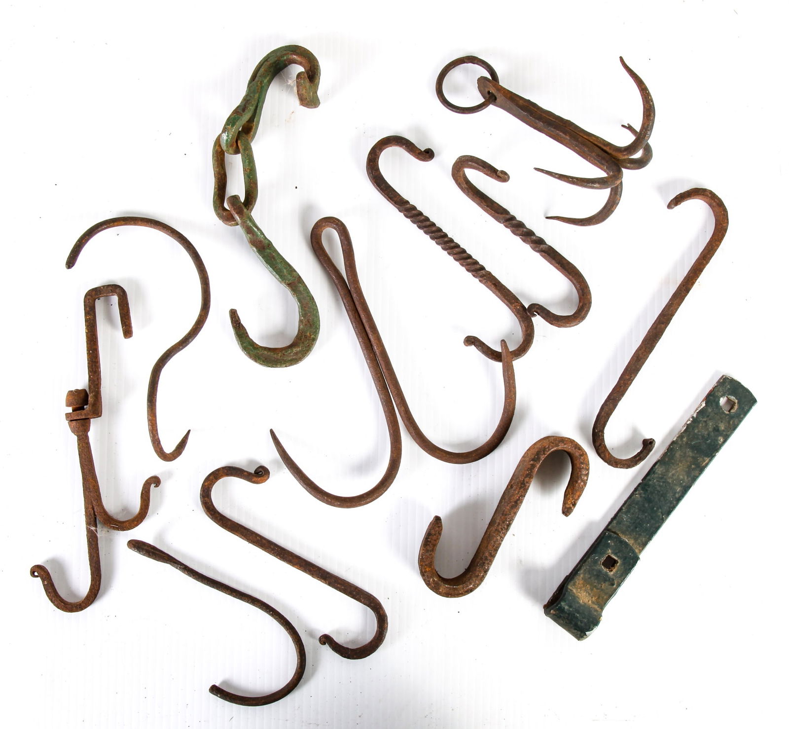 (10) EARLY IRON HOOKS: Mostly hearth hooks. approximately 8 inches long.