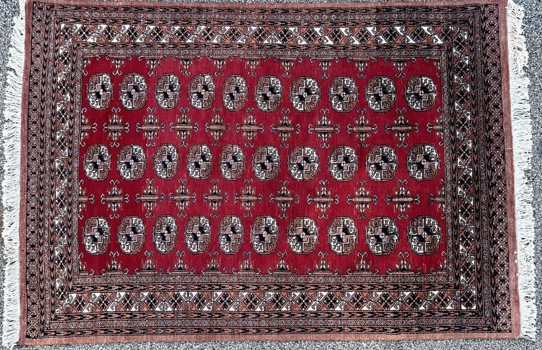 VINTAGE PAKISTANI RUG: Bokhara design. 7'1" x 4'3"