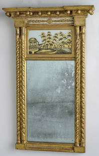 FEDERAL PERIOD GILT MIRROR WITH DOUBLE TWIST: COLUMNS, eglomise upper section. 37 x 23 inches wide.