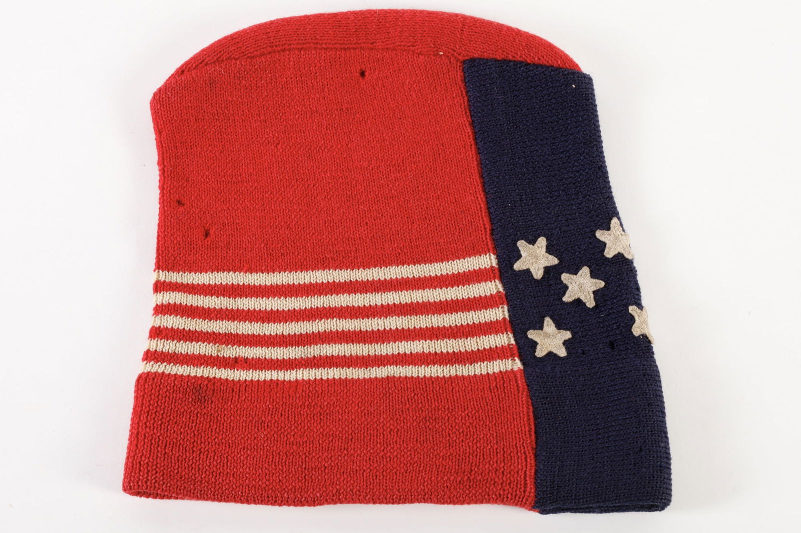 SKATER'S KNIT CAP -- GRENOBLE: Red cap with white stripes and stars on blue field. Label reads: "Devise et Gay Grenoble Made in France"