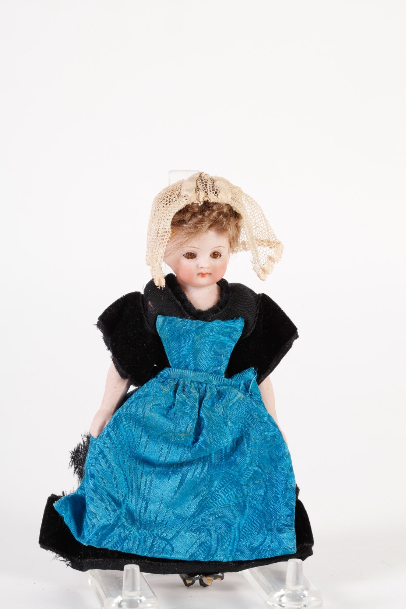 BISQUE DOLL IN BLACK & BLUE DRESS: 6 inches tall