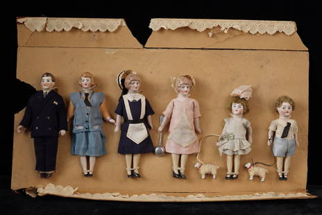 VINTAGE SET OF BISQUE DOLLHOUSE FIGURES: includes a man, a woman, the maid, the cook, a little girl, and a little boy, all smartly dressed. Adults are 5 inches tall.